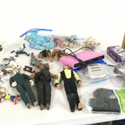 A collection of assorted toys..includes Action Man..Shrek.. vintage Batman mug..Disney key rings etc. selection of smart leads and digital terrestrial receiver. No reserve.