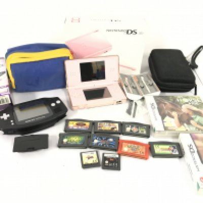 A Boxed Nintendo DS Light and a Game Boy A/F and a Collection of Games.