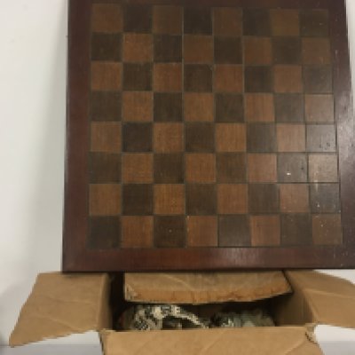 A wooden chess board with medieval resin pieces. Also a collection of 14 Cherished Teddies ornaments. No reserve. (2)