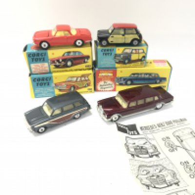 4 Boxed Corgi Vehicles. A Volkswagen 1500 Karmann Ghia #239. A Mini-Cooper #249. A Ford Consul Cortina Super Estate Car #491 and a Mercedes Benz 600 Pullman #247.