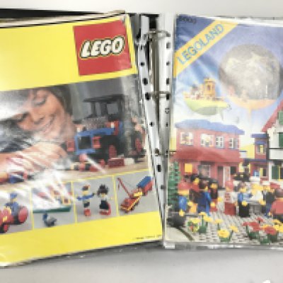 2 Boxes Containing Loose Vintage Lego with A Binder of Manuals. No Reserve.(2).