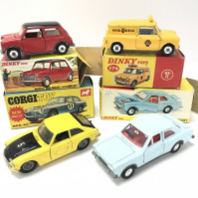 A Boxed Dinky Morris Mini-Minor #183. An A.A. Mini Van #274. A Ford Escort #168 and a MGC GT (No Case) #345.