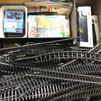 A Box Containing 00 Gauge Track. Model kits and Oxford Diecast.