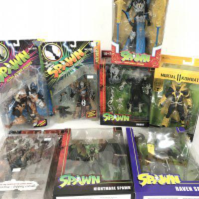 A Collection of 8 Boxed Spawn Figures