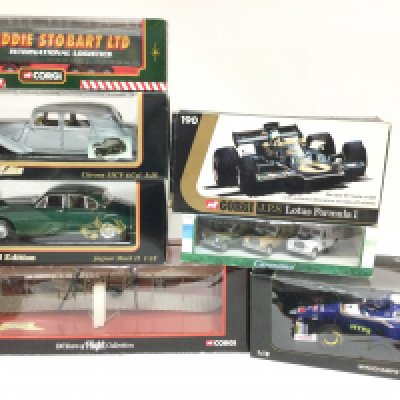 A Collection of Boxed Diecast including Maisto. Corgi and Minichamps.