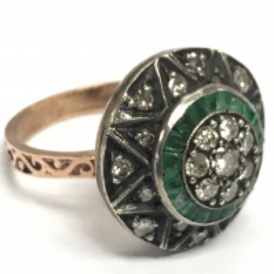 An 8ct rose gold large target style dress ring set with square and mixed-cut emeralds and RBC diamonds. Emeralds 0.35ct approx. Diamonds 0.50ct approx. 6.50g total weight