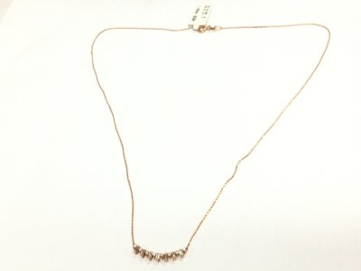 A 14ct rose gold necklace set with diamonds, 1.4g total weight approximately.