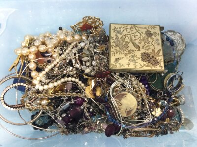 A collection of costume jewellery including brooches, necklaces, bracelets etc