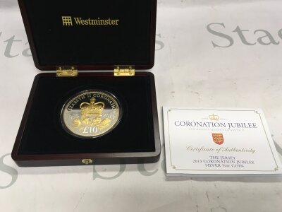 A 5oz 925 silver coin with gold plating for coronation jubilee.