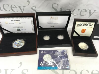 Collection of assorted silver coins including 2oz D Day commemorative round.