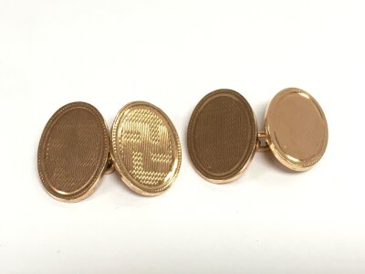 A pair of 9ct gold cufflinks. 13.40g