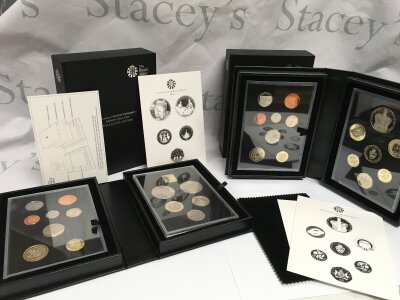 Two Royal Mint UK Proof coin sets , 2013 and 2015.