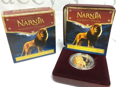A boxed Royal Australian Mint Narnia Aslan $1 Gold Plated silver proof coin