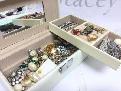 A collection of costume jewellery including brooches, earrings. Rings etc