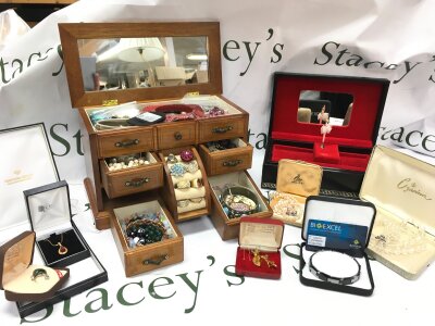 A large collection of costume jewellery including necklaces, bracelets , rings