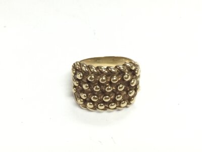 A 9ct gold keepers ring. Size S and 11.96g