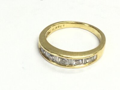 A high carat gold half eternity ring with diamonds and moissanite. Size N and 4.58g