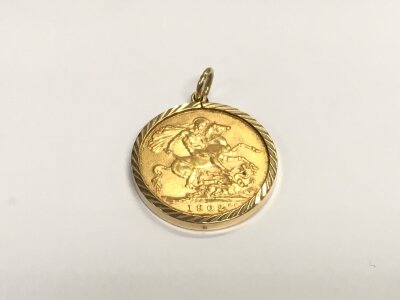 1902 full sovereign in mount.
9.31g