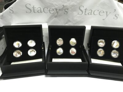 Three portraits of Britain silver proof four coin sets.
Postage B