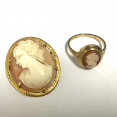 A 9ct gold mounted cameo brooch and conforming ring. 