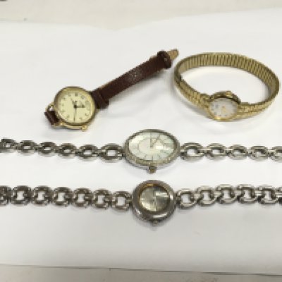 A silver ladies watch and three others. NO RESERVE
