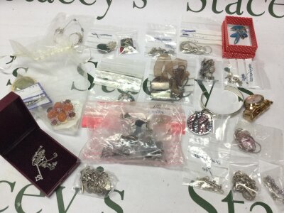 A mixed collection of silver and costume jewellery including necklaces, bracelets, brooch etc