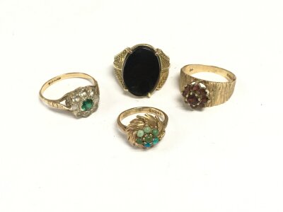 Four 9ct gold rings set with stones, total approx 12.7g.