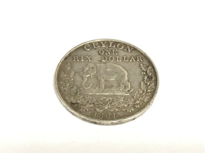An 1821 Ceylon silver coin.