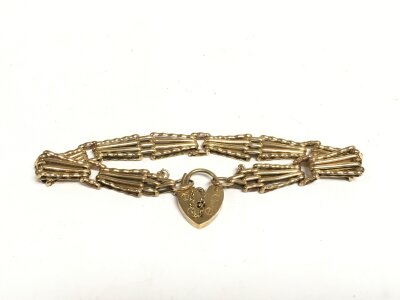A 9ct gold four bar gate bracelet, approx 11.6g.