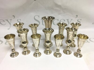 Twelve silver Judaica Kiddush cups,