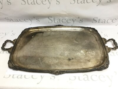 A large silver tray with shell and scrollwork motifs, approx length 76cm and approx weight 4.2kg. Chester 1913, by Sherman D Neill Ltd of Belfast.