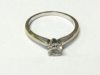 An 18ct white gold solitaire diamond ring. Size M 1/2 and 2.66g diamond approximately 0.50ct.