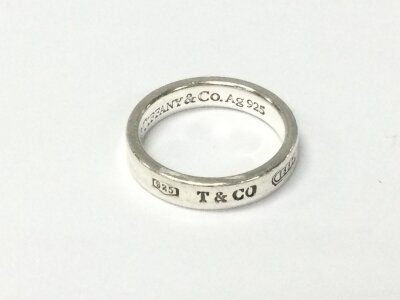 Tiffany and Co silver ring size M with box.