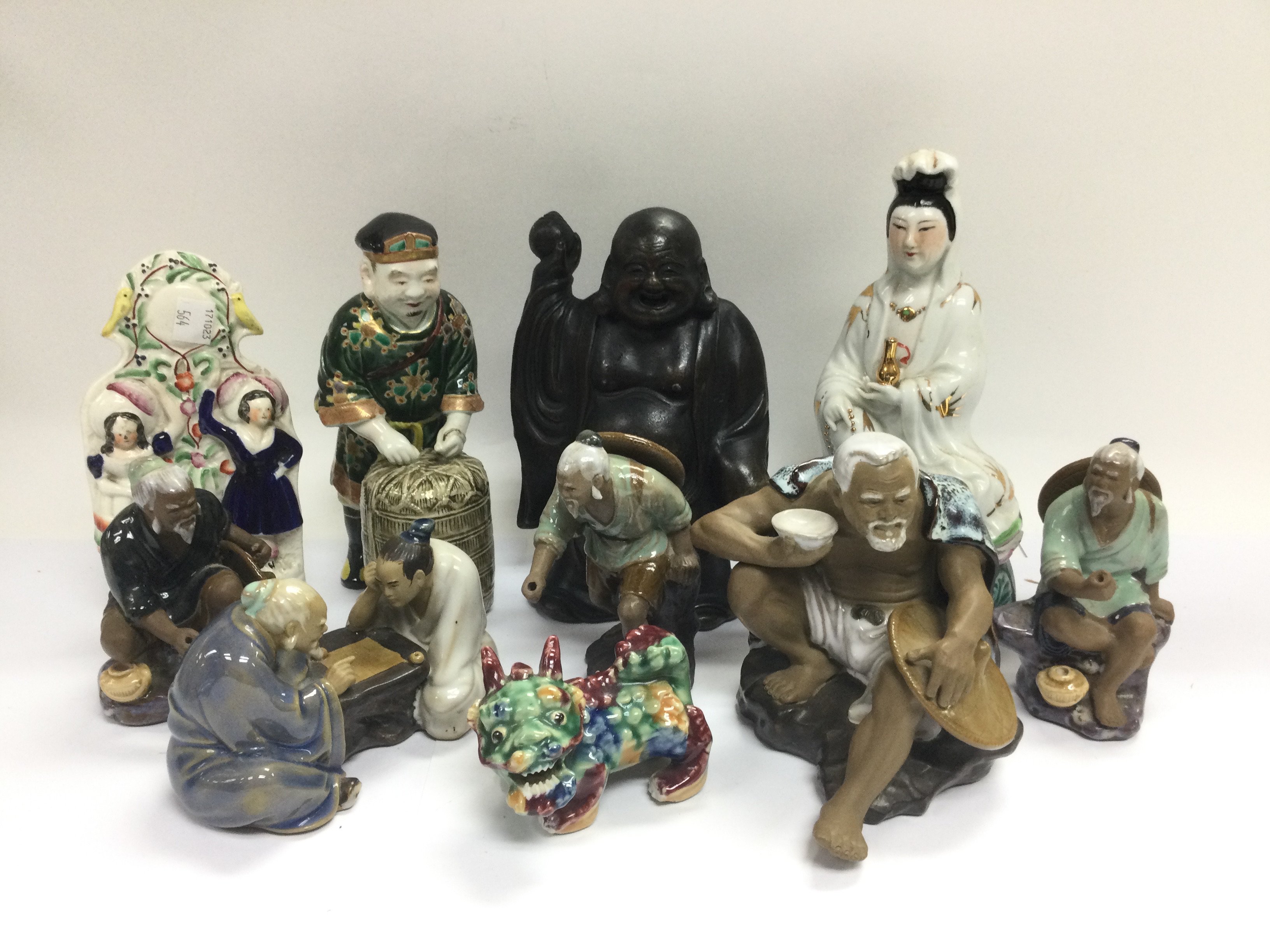 A collection of mainly Oriental figures. Shipping category D.- NO RESERVE