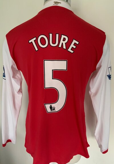 2006 - 2007 Arsenal Match Worn Football Shirt: Red long sleeve with Toure 5 to rear and Premier League sleeve badging. Worn in first season at the Emirates.