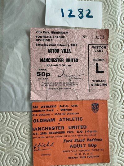 74/75 Manchester United Away Football Tickets: Good condition league match tickets from the 2nd division season v Aston Villa and Oldham. Creasing. (2)