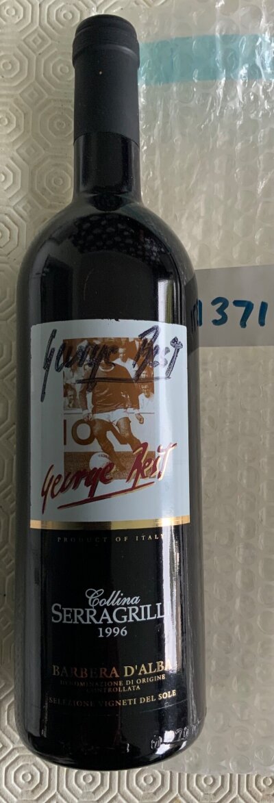 George Best Manchester United Signed Bottle Of Wine: George Best branded Italian wine with contents intact. Hand signed without dedication to label. Personally obtained by vendor who used to hire him for functions.