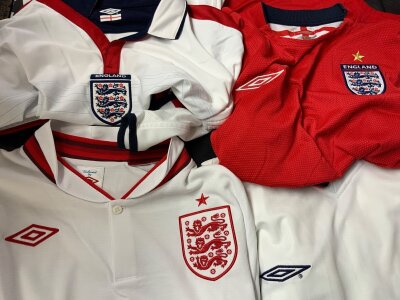 Manchester United + England Football Shirts: 16 official Man Utd shirts plus 4 official England shirts. All men’s sizes to include some extra polo shirts. Mainly good condition.