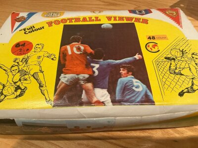 1970 Football Viewer Colour Collectables: Complete box of 48 sealed Football Viewers from around 1970. Available for 6d each originally. All unopened in original vendor box. There was a full set of 9 which we believe would be enclosed