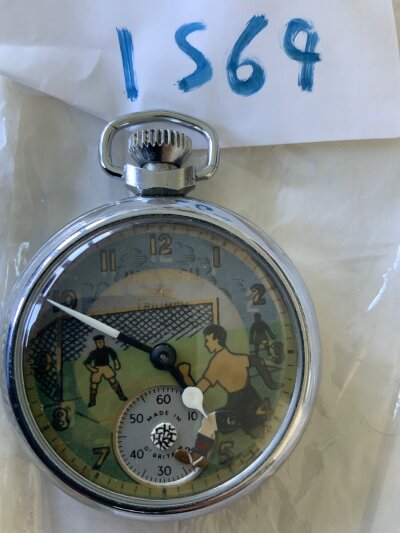 Football Pocket Watch: Ingersoll Triumph stop watch in working order depicting a football scene in working order. Good condition.