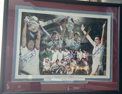 West Ham 1980 FA Cup Winners Signed Football Print: stunning large print nicely framed with claret and blue mount. Depicts moments from the cup final and is signed by all 11 winning players. Coz from reputable source.