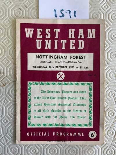 62/63 West Ham v Notts Forest Postponed Football Programme: Boxing Day fixture in good condition with no team changes but the word postponed written inside to team page and a few scores filled in.