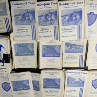 1960s Huddersfield Town Home Football Programmes: Includes 63/64 Man Utd v Sunderland FA Cup 2nd replay x 2 and a further 200 spanning the 60s. Mainly good condition with duplication. (est 200)