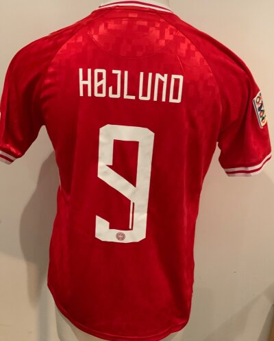 Denmark 2024 - 2025 Match Worn Football Shirt: International short sleeve red Shirt with number 9 Hojlund to rear. Worn v Switzerland on 5 September 2024. Match details to front of shirt.