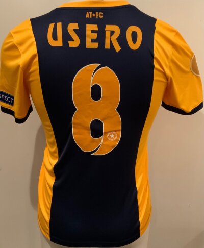 Tripoli 2014 - 2015 Match Worn Football Shirt: Europa League short sleeve yellow and blue Shirt with number 8 Usero to rear. Worn v Tottenham.