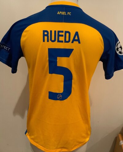 Apoel 2017 - 2018 Match Worn Football Shirt: Champions League short sleeve yellow and blue Shirt with number 5 Rueda to rear. Worn v Tottenham.