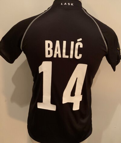 Lask 2020 - 2021 Match Worn Football Shirt: Europa League short sleeve black Shirt with number 14 Balic to rear. Worn v Tottenham.