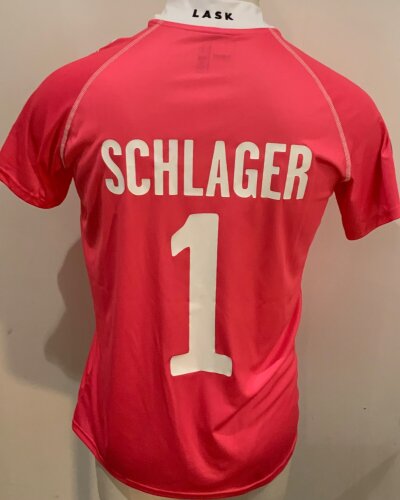 Lask 2020 - 2021 Match Worn Football Shirt: Europa League short sleeve pink goalkeeper Shirt with number 1 Schlager to rear. Worn v Tottenham.