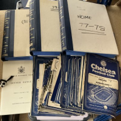 Chelsea Football Programmes: Quantity of mainly modern home programmes to include 3 home seasons with official binders. Includes about 50 programmes from the late 50s to mid 60s. Also includes a Fulham menu from 1962. Two boxes with instructions to sell. 