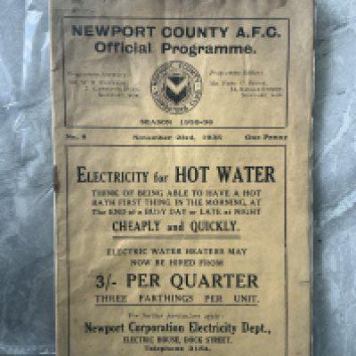 35/36 Newport County v Clapton Orient Football Programme: Staining throughout  possibly through water damage so at best fair condition with a team changes and score to middle page. Staple present but not holding all pages. No paper loss.